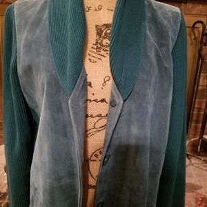 A knit top and suede jacket.